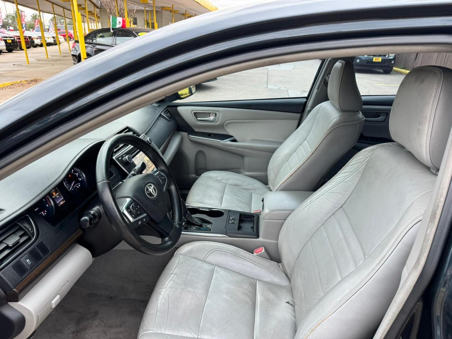 2016 Toyota Camry (4T1BF1FKXGU) , located at 16710 Clay Rd., Houston, TX, 77084, (281) 859-7900, 29.834864, -95.656166 - Photo#4